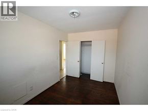 Brantford apartment for rent - A room with a door and a window.