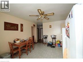 Brantford apartment for rent - A dining room with a table set for a meal.