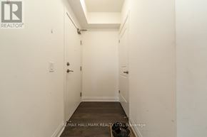 Toronto (Scarborough Village) condo for rent - A hallway with a door on the left and a door on the right.