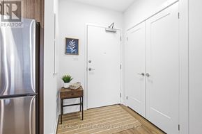 Cambridge condo for rent - A small room with a table and a plant on it.