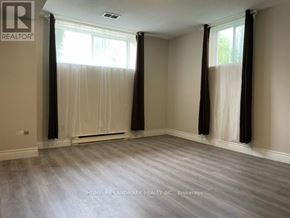 Richmond Hill (Oak Ridges) apartment for rent - A room with a window and curtains is for sale.