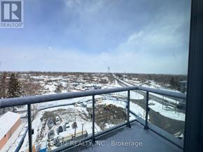 Toronto (Centennial Scarborough) condo for rent - A view from a balcony looking out at a snowy landscape.