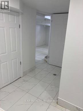 Ottawa apartment for rent - A white door is on the left and a white wall is on the right.