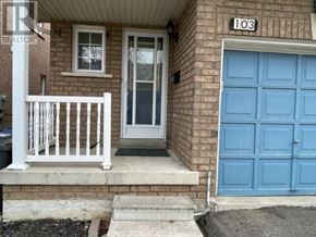 Brampton (Fletcher's Meadow) apartment for rent - A house with a blue door and a white porch.