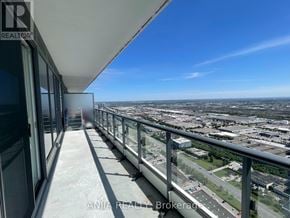 Vaughan (Vaughan Corporate Centre) condo for rent - A balcony with a view of a cityscape.