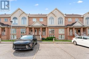 Ottawa condo for rent - A black car is parked in front of a building with a sign that reads "REALTOR".