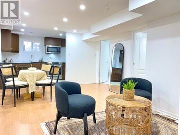 Richmond Hill (North Richvale) apartment for rent - A living room with a dining table and chairs.