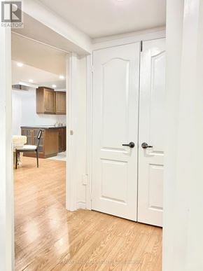 Richmond Hill (North Richvale) apartment for rent - A white door is open to a kitchen.