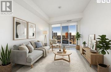 Toronto (Newtonbrook East) condo for rent - A well-lit living room with a grey sofa and a wooden coffee table.