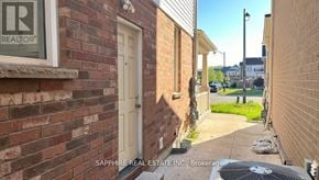 Milton (Cl Clarke) apartment for rent - A two-story house with a garage and a brick facade.