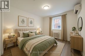 Toronto (Cabbagetown-South St. James Town) condo for rent - A bedroom with a bed, nightstands, and a window.