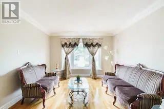 Mississauga (Creditview) apartment for rent - A living room with a sofa set and a glass coffee table.
