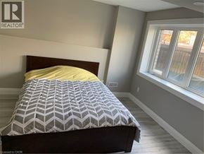 Cambridge apartment for rent - A bedroom with a bed and a window.