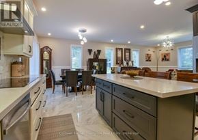 Huntsville (Chaffey) duplex for rent - A kitchen with a dining table and chairs.