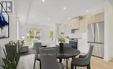 Toronto (Weston) multi-family for rent - A modern dining room with a table set for four.
