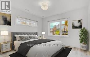 Toronto (Weston) multi-family for rent - A bedroom with a large bed, a nightstand, and a plant.