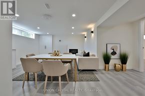 Richmond Hill (Crosby) apartment for rent - A modern dining room with a white table and chairs.