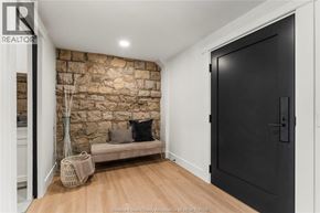 Amherstburg condo for rent - A black door is on the right side of the image.
