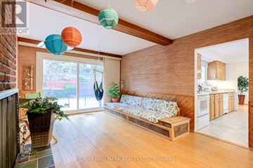 Toronto (L'amoreaux) apartment for rent - A living room with a sofa and a TV.