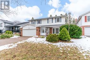 Toronto (L'amoreaux) apartment for rent - A house with a white garage door and a brick chimney.