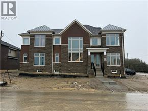Binbrook apartment for rent - A house under construction with a grey sky in the background.