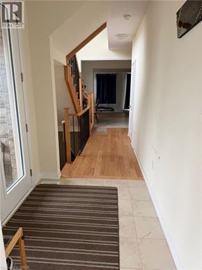 Binbrook apartment for rent - A hallway with a striped rug on the floor.