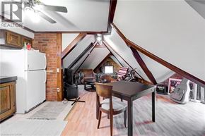 Hamilton apartment for rent - A room with a table and chairs in it.