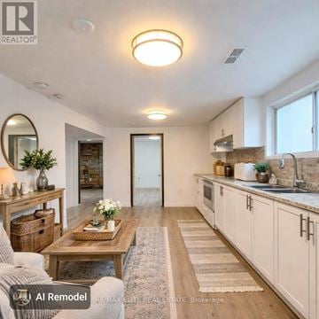 Toronto (Newtonbrook East) apartment for rent - A well-lit, modern kitchen and living room with a dining table and chairs.