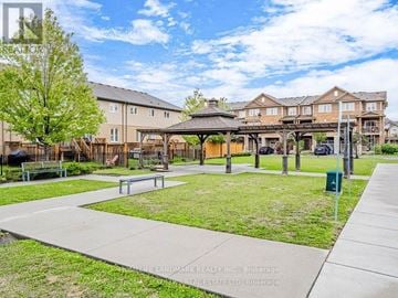 Hamilton townhouse for rent - A sunny day at a park with a gazebo and benches.