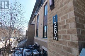 Ottawa townhouse for rent - A building with a sign that says 126A on it.
