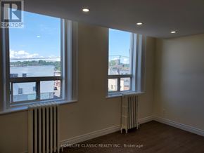 Uxbridge apartment for rent - A room with a window and a radiator.