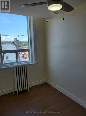 Uxbridge apartment for rent - A room with a window and a fan.