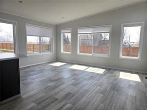 Mitchell apartment for rent - A modern kitchen with a large island and stainless steel appliances.