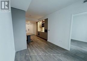 Toronto (Church-Yonge Corridor) condo for rent - A realtor photo of a room with a kitchenette and a dining area.