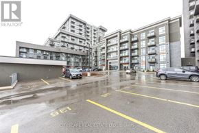 Hamilton (Waterdown) condo for rent - A parking lot with the number 961 painted on the ground.