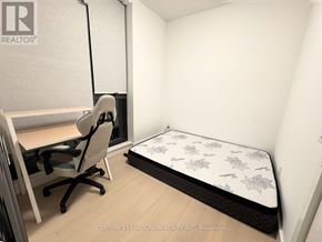 Toronto (Church-Yonge Corridor) condo for rent - A bedroom with a bed, desk, and chair.