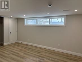 Toronto (Willowridge-Martingrove-Richview) apartment for rent - A room with a door and a window.