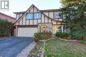 Toronto (Don Valley Village) apartment for rent - A house with a brown and white facade is for sale.