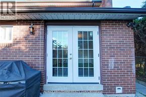 Toronto (Don Valley Village) apartment for rent - A white double door with glass panels is the main focus of the image.