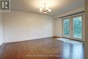 Toronto (Don Valley Village) apartment for rent - A room with wooden flooring and a chandelier.