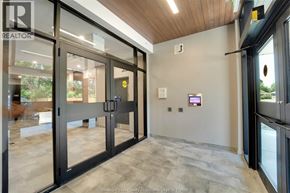Kingsville condo for rent - A modern office lobby with a glass door entrance.