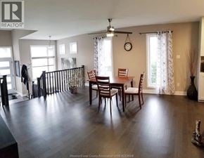 Wendover townhouse for rent - A dining room with a wooden table and chairs.