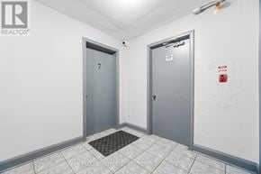 Oakville (Cp College Park) apartment for rent - A hallway with two doors, one of which is numbered 7.