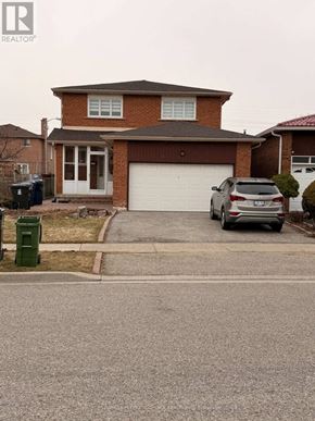 Toronto (West Humber-Clairville) apartment for rent - A house with a brown roof and a grey car parked in front.