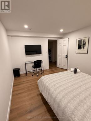 Toronto (West Humber-Clairville) apartment for rent - A bedroom with a bed, desk, and chair.