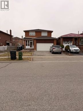 Toronto (West Humber-Clairville) apartment for rent - A house with a brown roof and a driveway in front of it.