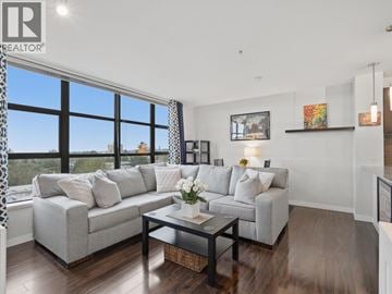 New Westminster apartment for rent - A living room with a grey couch and a coffee table.