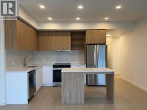 New Westminster apartment for rent - A modern kitchen with wooden cabinets and stainless steel appliances.