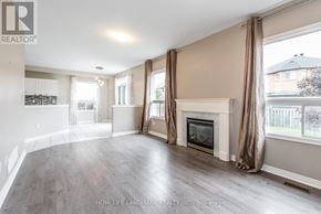 Markham (Village Green-South Unionville) apartment for rent - A spacious living room with a fireplace and large windows.
