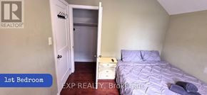Toronto (Brookhaven-Amesbury) apartment for rent - A bedroom with a bed, nightstand, and closet.